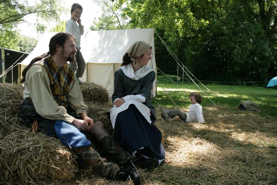 relaxing in the hay, watching the children